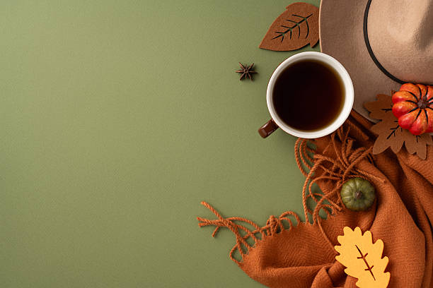 istock Warm and inviting autumn scene featuring seasonal elements like coffee and decorations, perfect for capturing the Fall atmosphere 2229990341