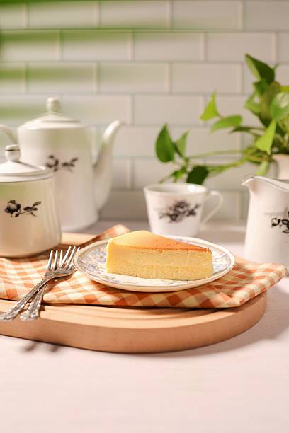 Cheesecake in ceramic plate on white background