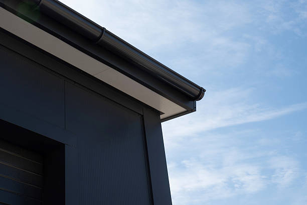 istock PVC rain gutter at eaves with soffit and fascia 2229996082