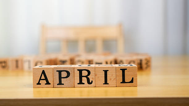 istock April wooden blocks arranged on table create cheerful and inviting atmosphere, symbolizing arrival of spring and new beginnings. warm tones of wood enhance overall aesthetic 2230004829