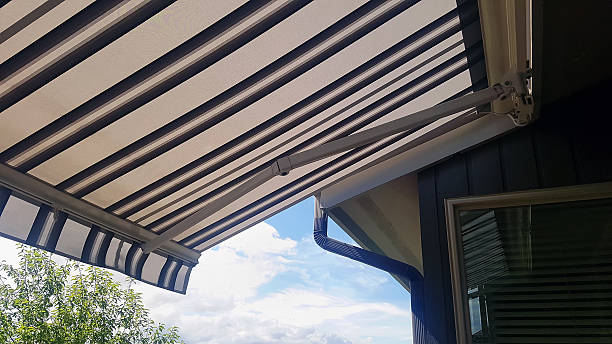 istock Under The Residential Awning Looking Towards Soffit, Eaves Trough and Downspout 2230006639