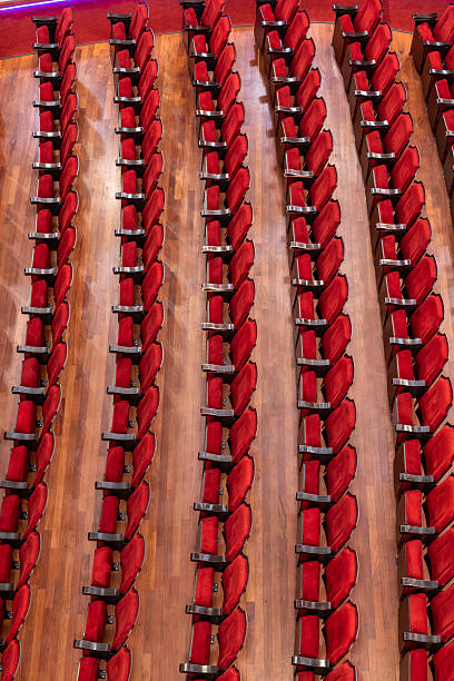istock Empty theater red seats - stock photo 2230013220