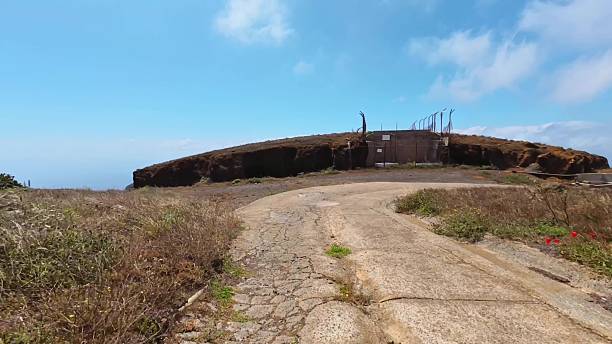 istock Embarking on a Journey Through the Abandoned Paths Amidst Breathtaking Volcanic Island Scenery 2230014035