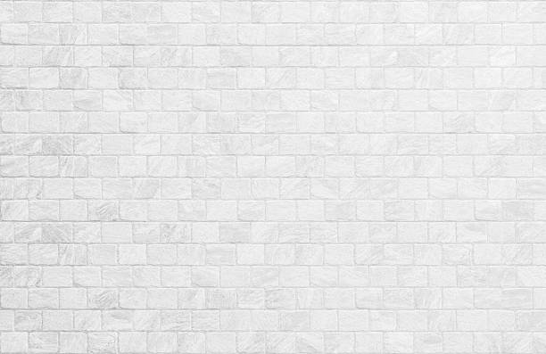 istock Close up modern white brick tiles wall texture background. 2230021393