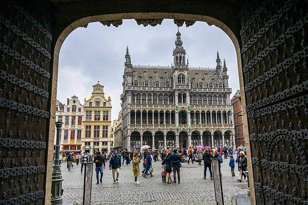 The Grand Place framed by the old gate of Brussels Town Hall stock photo