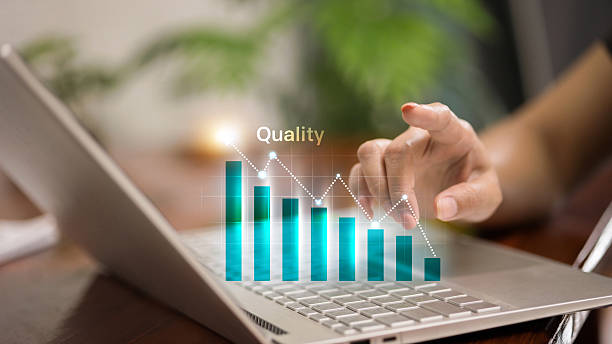 istock Business quality analysis with digital graph and performance metrics on laptop screen 2230026639