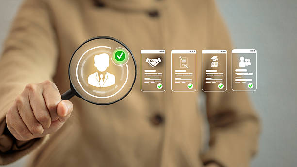 istock Human Resource Recruitment Concept with Magnifying Glass and Candidate Profile 2230026798