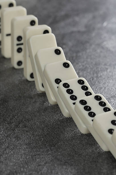 istock white domino blocks on black background 2230027265