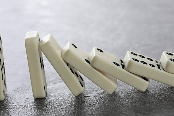 istock white domino blocks on black background 2230027282