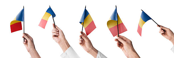 The Chad flag in hand in different angles on a white background.