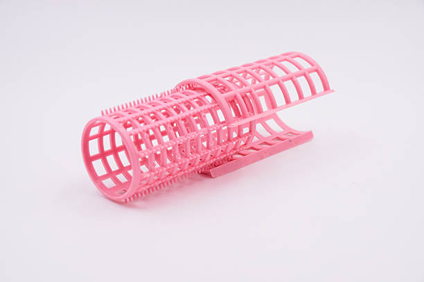 istock Easy to use plastic hair rollers to make curls or add volume 2230050772