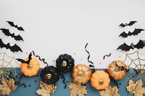istock Halloween party border from pumpkins, bats, spider web on dark blue background top view. 2230052965