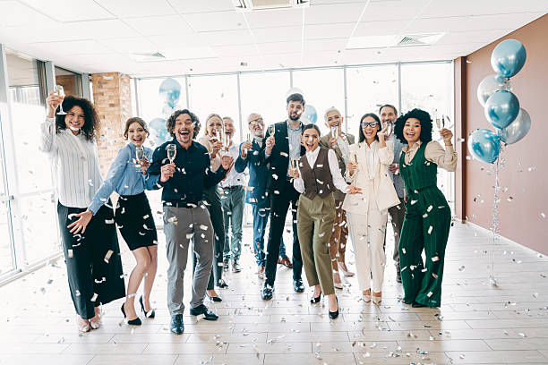 istock Professional team celebrating success with a toast in a modern office environment featuring joyful collaboration and unity 2230065502