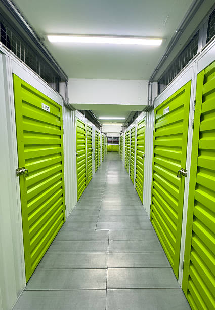 istock Modern Self-Storage Facility with Green Metal Doors 2230067199