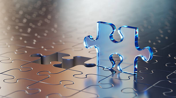 Transparent Puzzle Piece on Reflective Surface Symbolizing Solutions and Connections