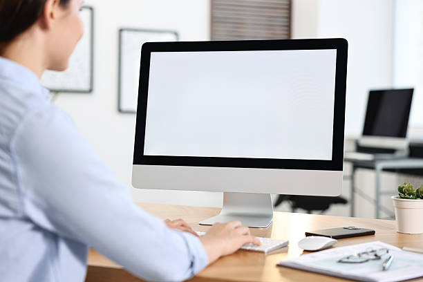 istock Woman working on computer at table in office, closeup 2230075044