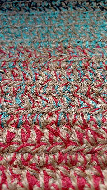 istock Colorful woven textile showcasing intricate patterns and craftsmanship created in a traditional workshop setting 2230083463