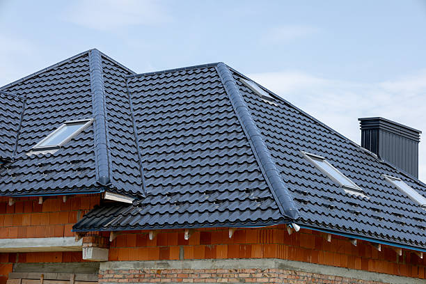 istock Roofing is being installed on a house under construction 2230088692