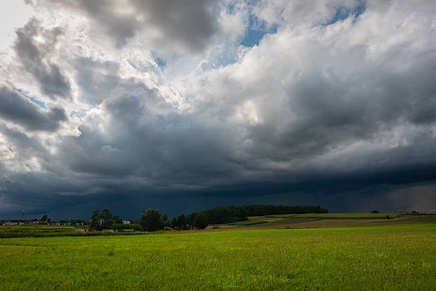 Dramatic view of an approaching thunderstorm over the fields near Ronnweg between the cities of Nuremberg and Munich in Bavaria, Germany.