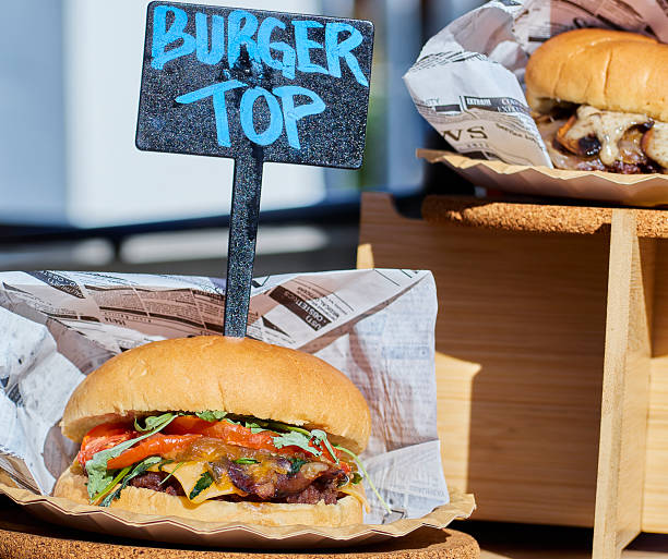 Close-up of delicious burgers during a hamburger food truck festival.