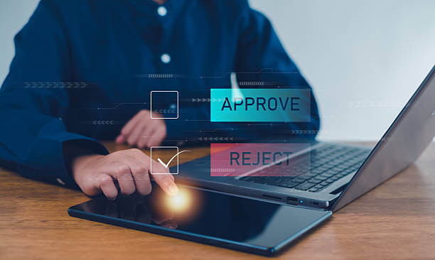 istock Approved, accept, pass inspection, Businessman writing or tick correct mark to approve document and project concept. 2230103656