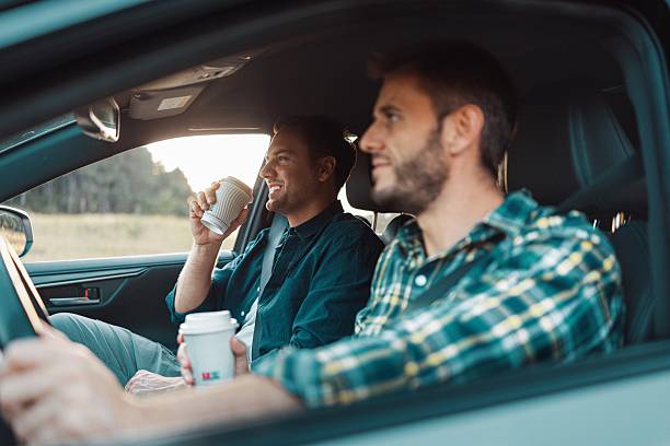 istock Friends enjoying coffee on a road trip 2230105324