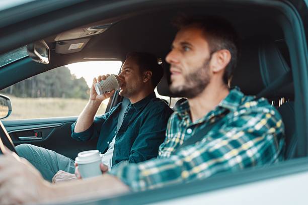 istock Coffee to go with friends on the road 2230105325