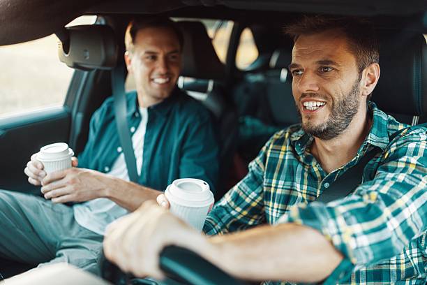 istock Friends enjoying coffee on a road trip 2230105351
