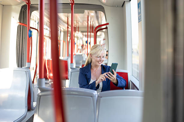 istock Businesswoman taking the tram to work 2230107535