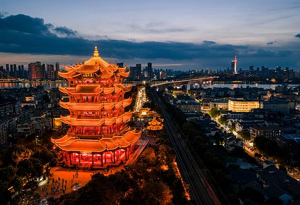 istock Illuminated Yellow Crane Tower at Dusk in Wuhan 2230108158