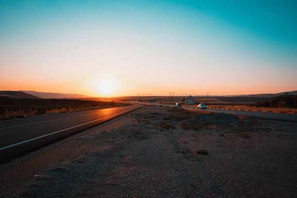 istock Golden Hour on a Country Road 2230109918