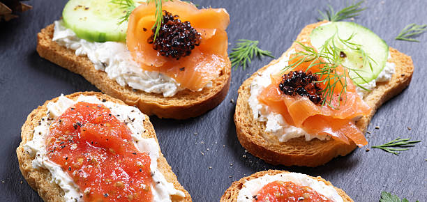 Cream Cheese Canapes with Salmon Cucumber and Caviar