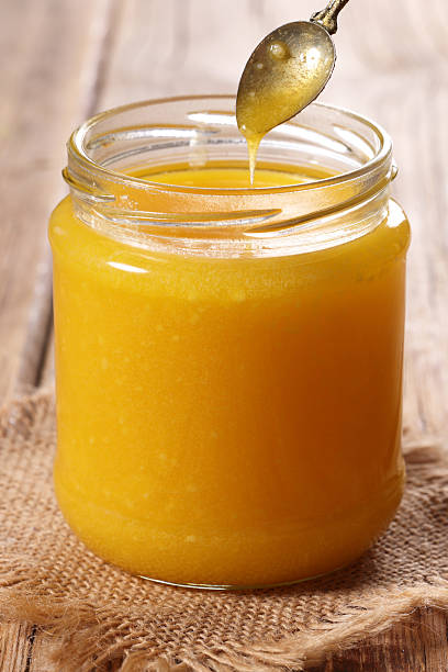 istock Ghee Butter in a jar with serving spoon. Indian cuisine 2230113209