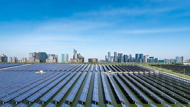 istock Solar Panels in Urban Area with Modern Skyline 2230114755