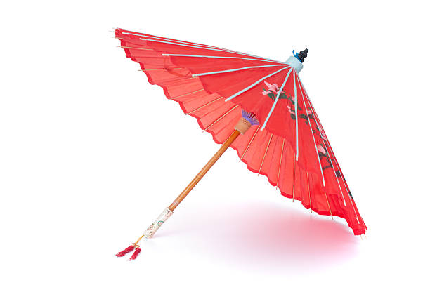istock Traditional paper chinese umbrella isolated on white background 2230116291