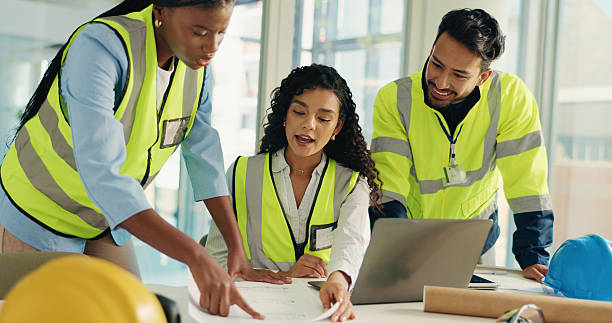 istock Brainstorming, people or sketch in office for floor plan, construction or architecture project. Talking, engineering design or builders with blueprint for installation, teamwork or renovation ideas 2230118107