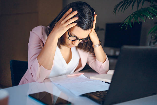 istock Business woman working at night 2230118173