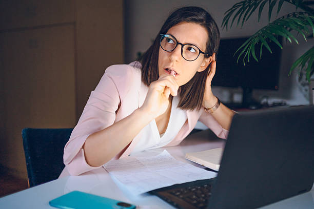 istock Business woman working at night 2230118660