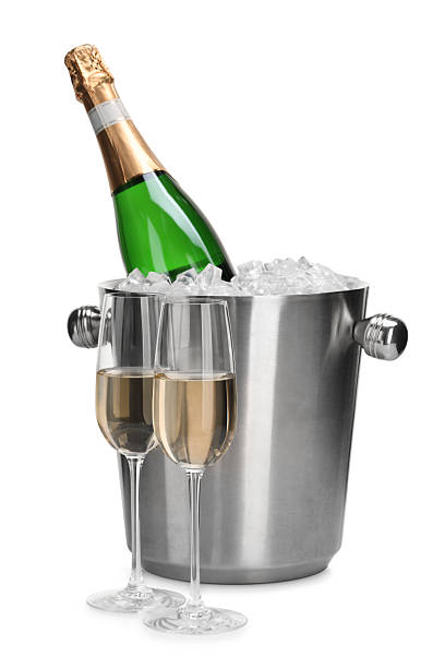 istock Champagne and bucket with ice isolated on white 2230121059