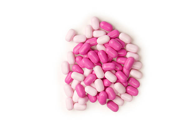 istock Sweet multicolored candies isolated on white background. 2230121514
