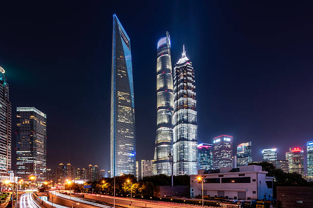 istock Illuminated Skyscrapers in Modern Urban Night Scene 2230122974