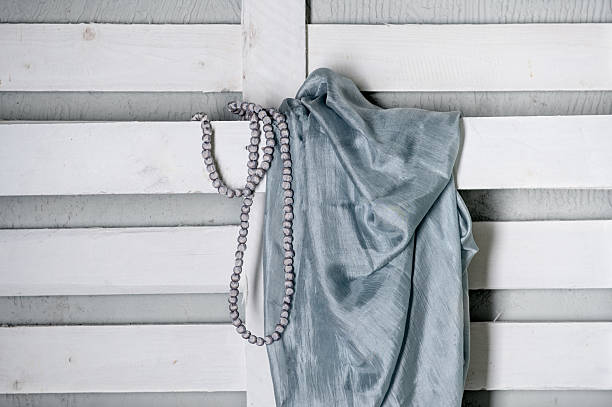 silk scarves leaning against a wall