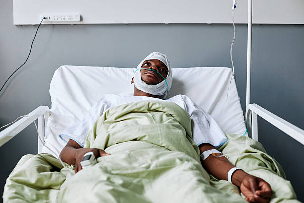 istock Young Man with Head Injury 2230130315