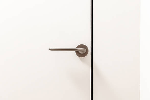 istock A silver door handle is shown in a mirror 2230131533