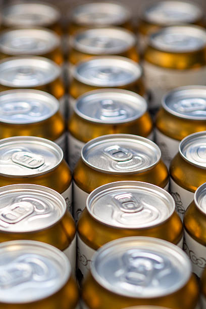 istock Rows of Golden Beverage Cans Ready for Refreshment 2230133601