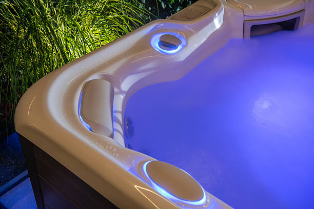 istock Relaxation Hot Tub With Serene Lighting in a Tranquil Garden Setting 2230133747