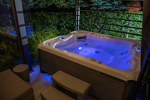 istock Relaxing Evening in a Luxurious Hot Tub Surrounded by Nature 2230134476