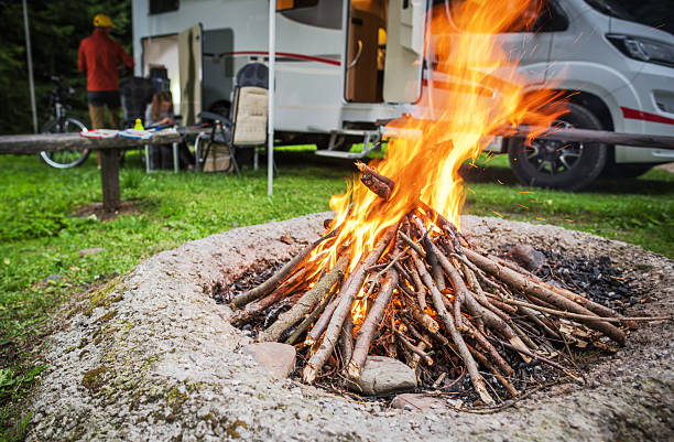 istock Campfire Gathering at a Scenic Campsite During a Summer Evening 2230134609