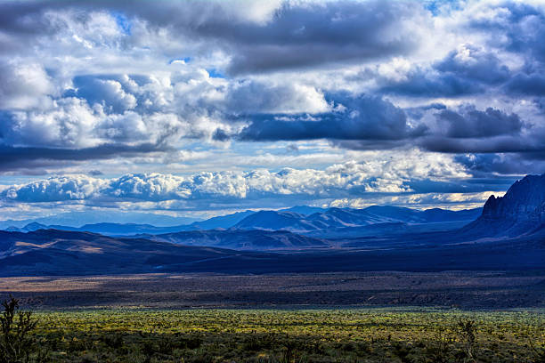 Waiting for the Rain Stormy Day in Red Rock Canyon with Dramatic Storm Clouds and Distant Spring Mountains, Mojave Desert, Nevada