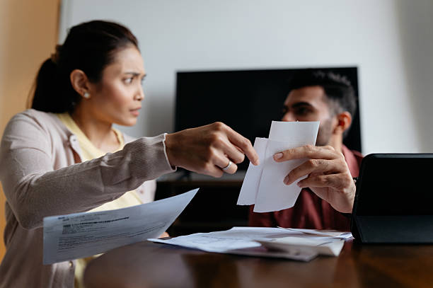 Concerned Couple Handling Monthly Bills